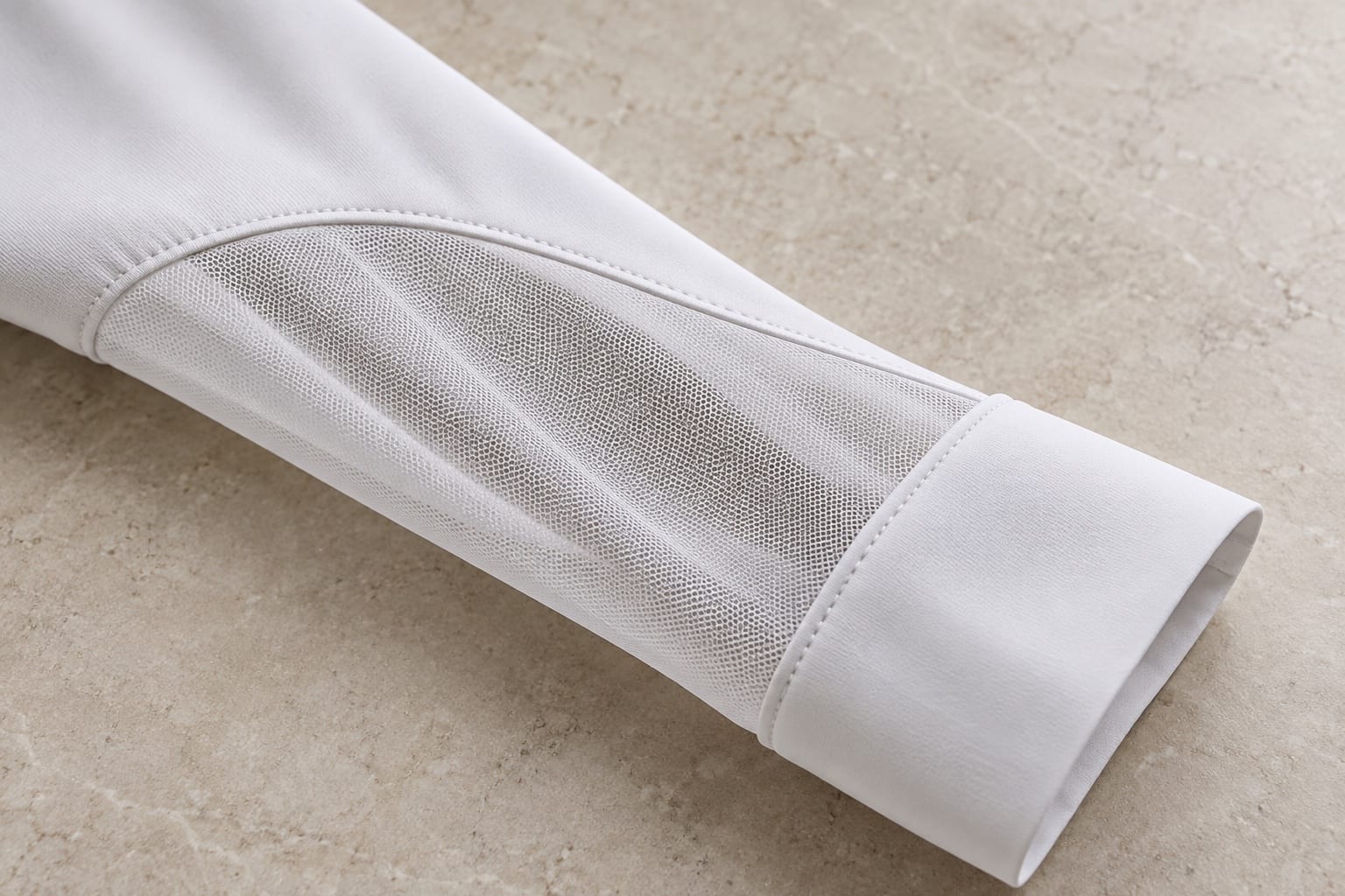Mesh-sleeve show shirt construction and material close-up concept