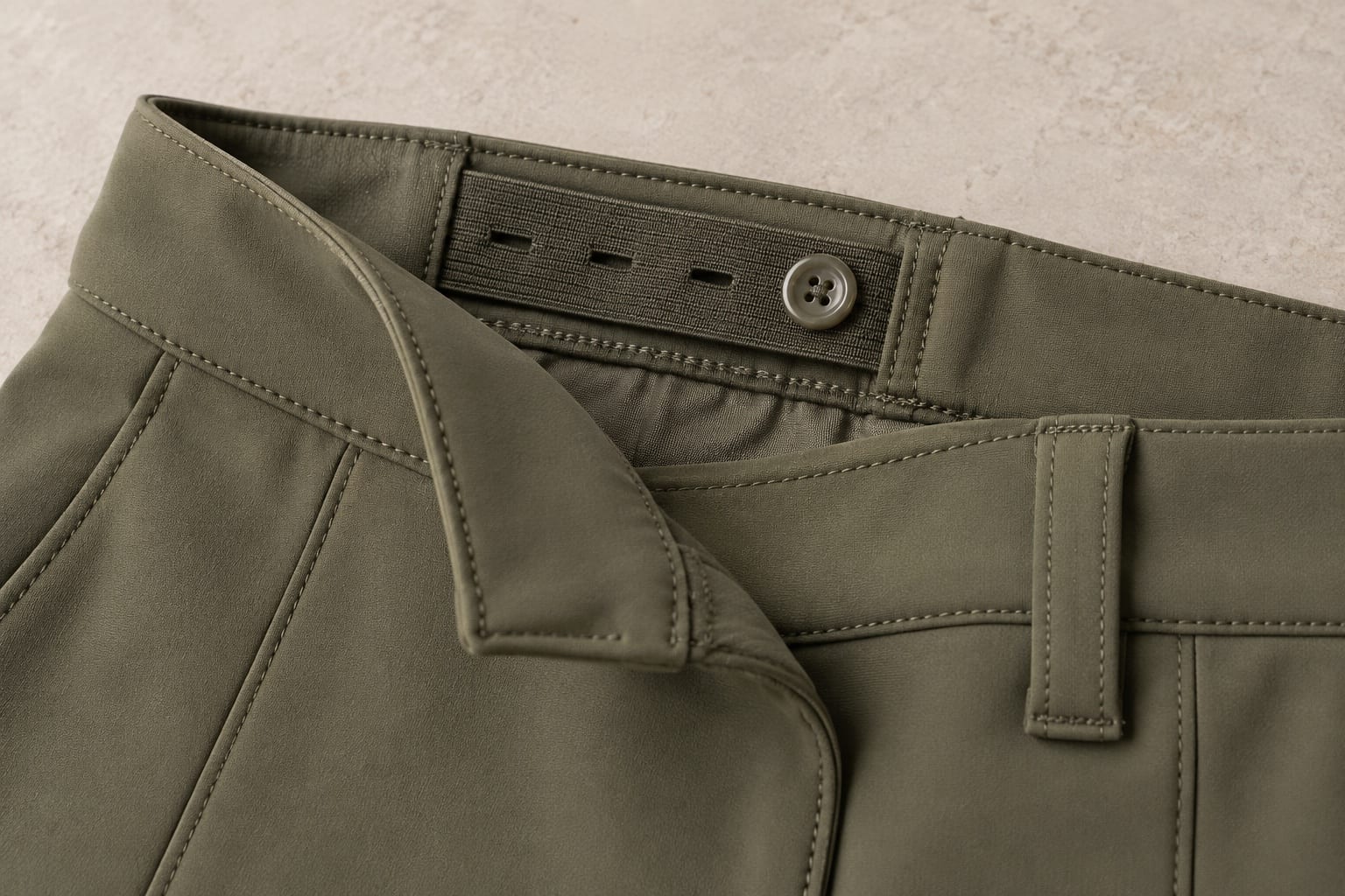 Youth adjustable-waist breeches construction and material close-up concept